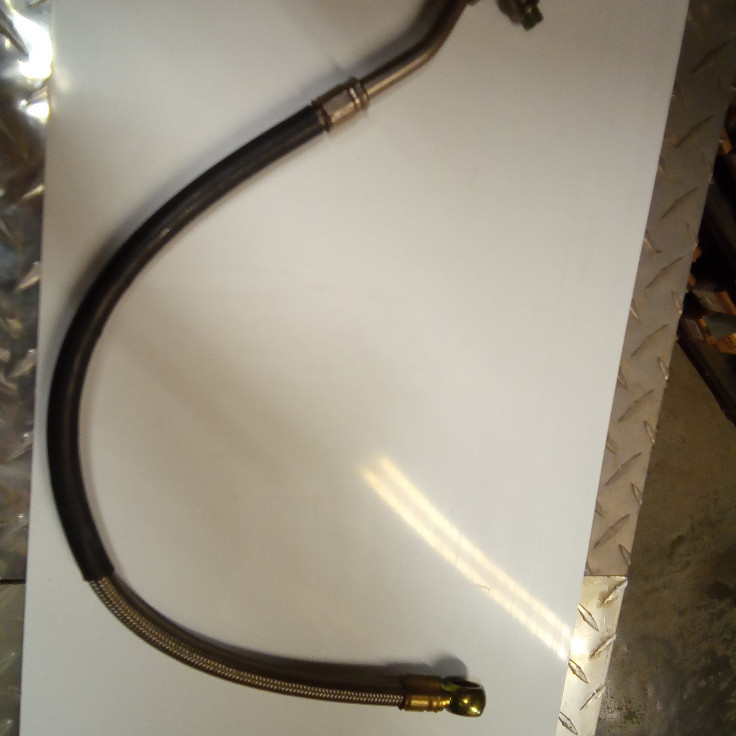 HOSE, OIL RADIATOR LH (#01162390)