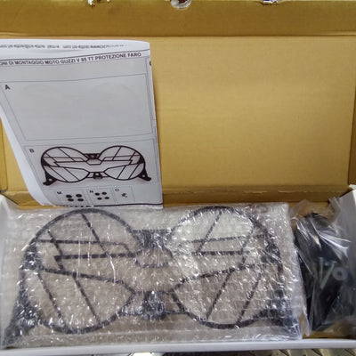 V85TT HEADLIGHT GUARD (#1108700)